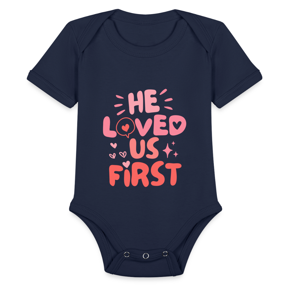 He Loved Us First (Pink) Baby Onesie Bodysuit - dark navy